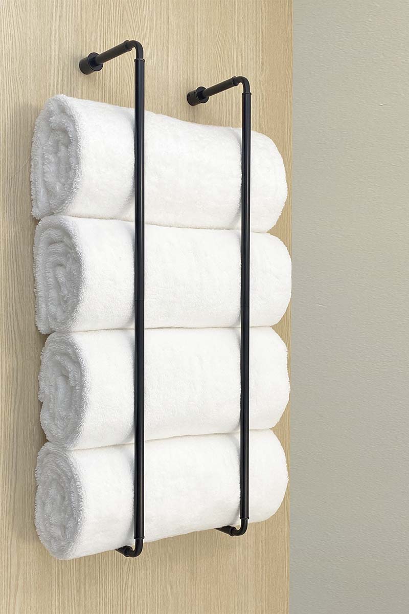 Rolled towel rack online wall